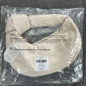 Melie Bianco Cream hand Bag